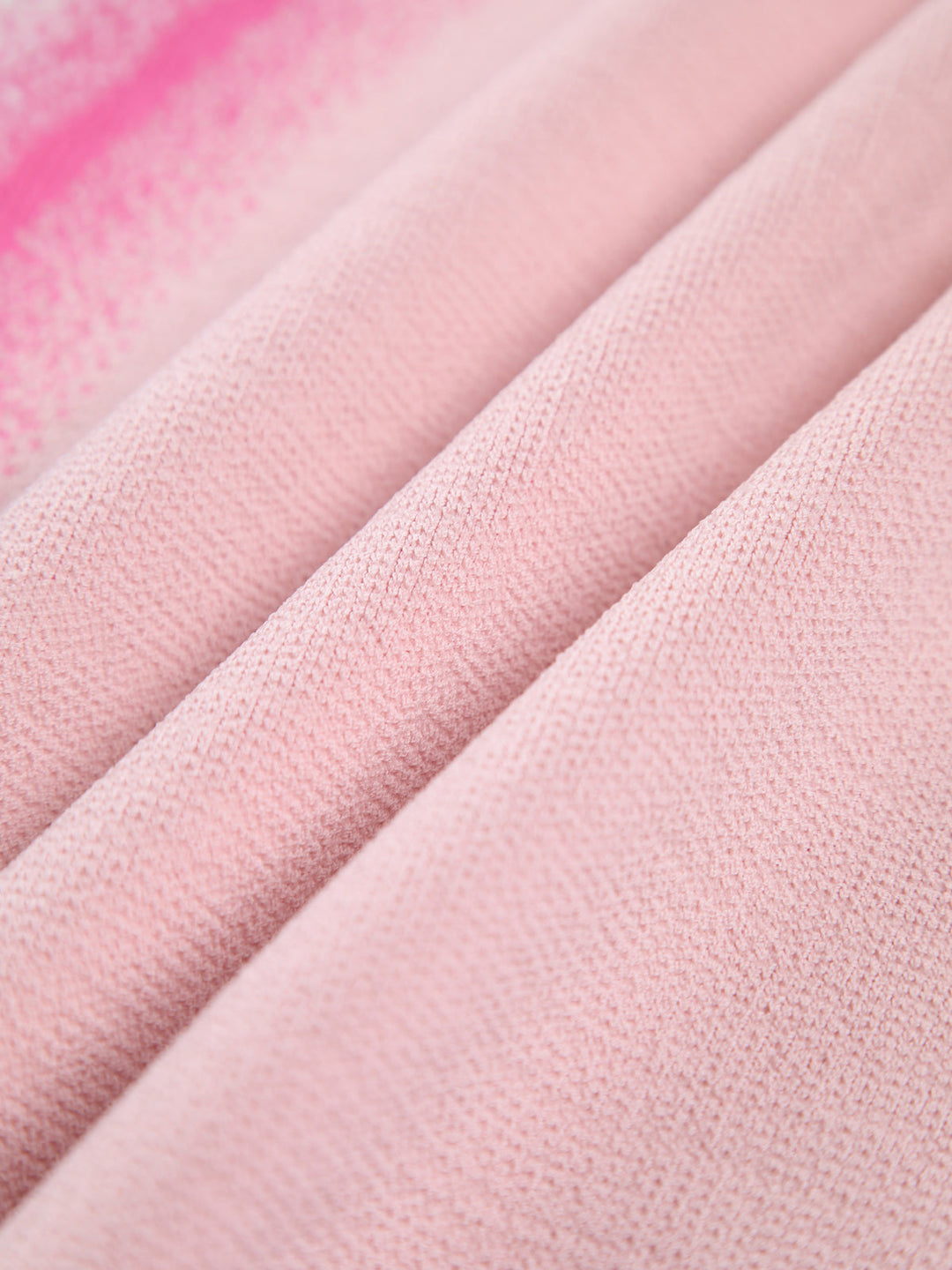 Unregelmäßiges ärmelloses langes Kleid aus Strick mit gewelltem Rand