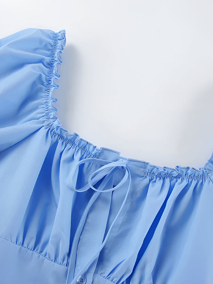 Kleid mit Rüschenbesatz und schulterfreiem Schnitt