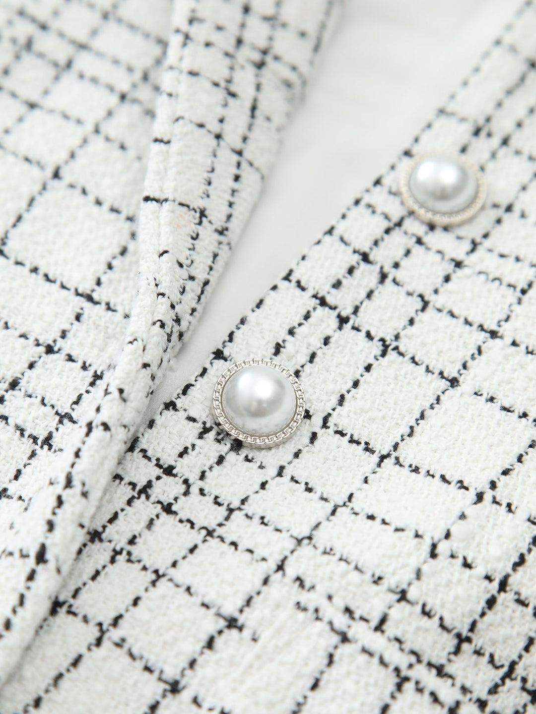 Kleid mit Karomuster und Perlenknöpfen