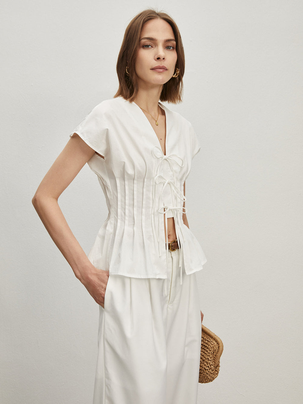 Baumwoll-Falten-Bluse mit Knoten