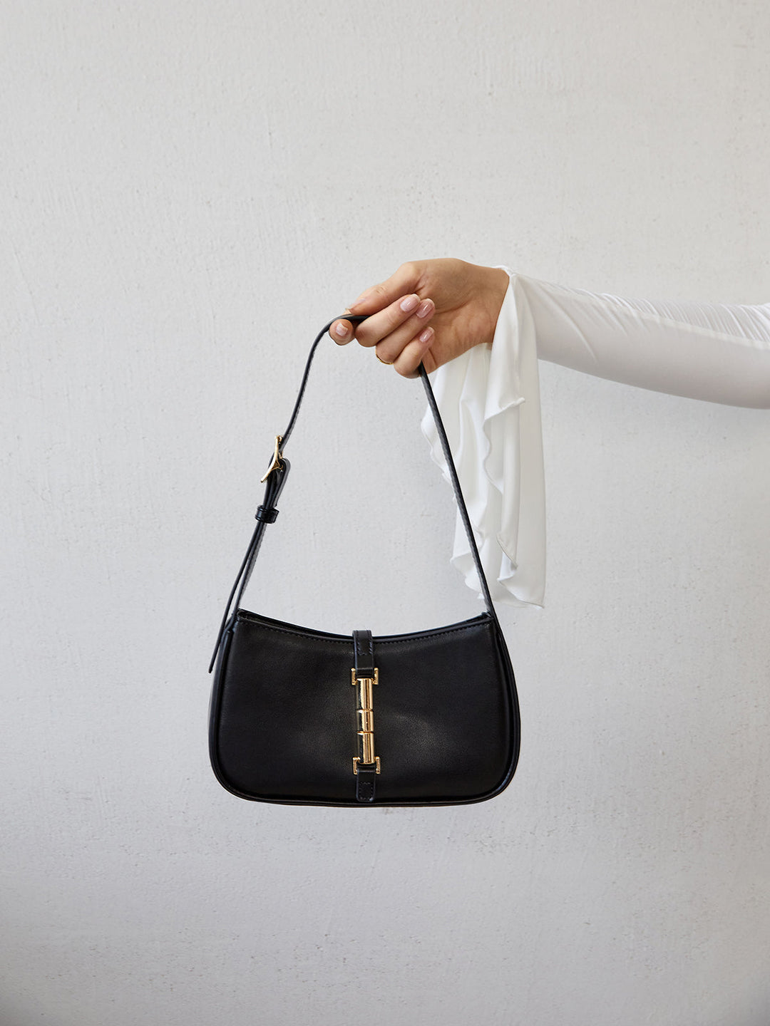 Goldene Wist Lock Schultertasche