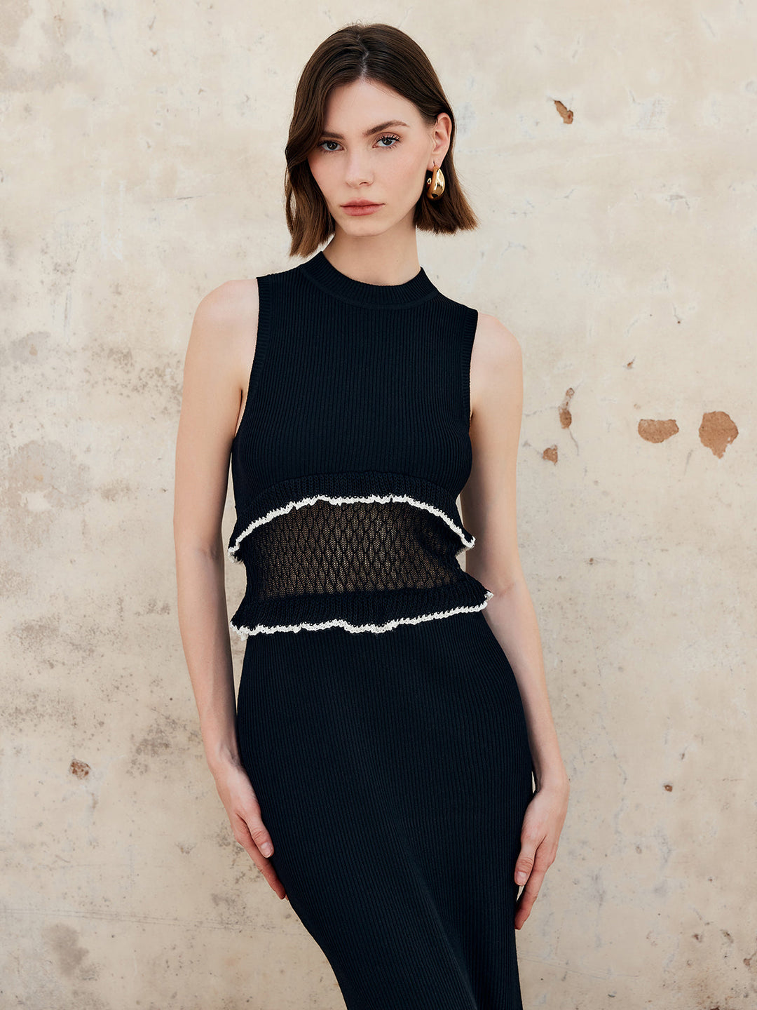 Ärmelloses Kleid mit durchsichtigem Saum