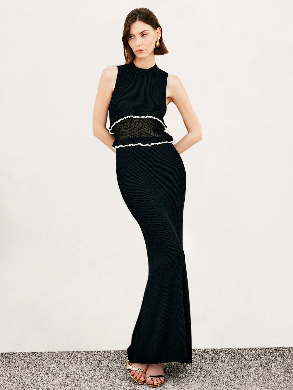 Ärmelloses Kleid mit durchsichtigem Saum