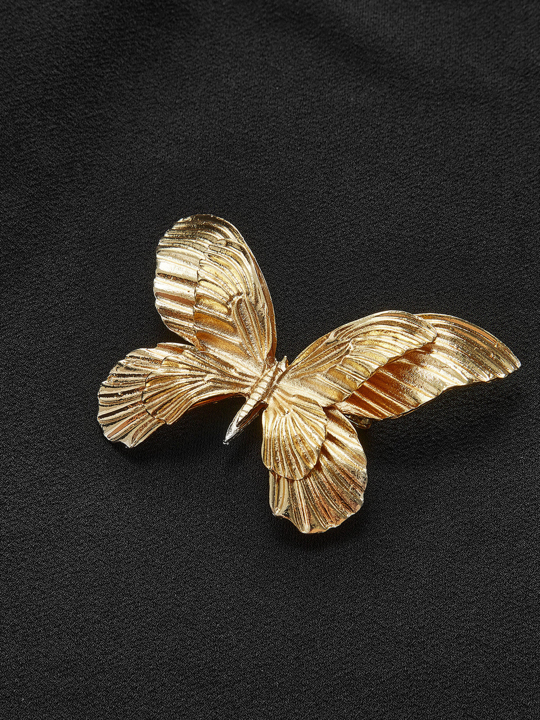 Asymmetrisches Metall-Schmetterling-Oberteil mit einem Schulterträger