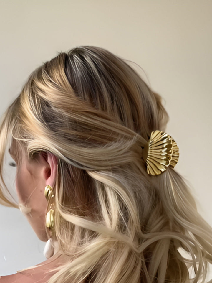 Goldene Haarkralle