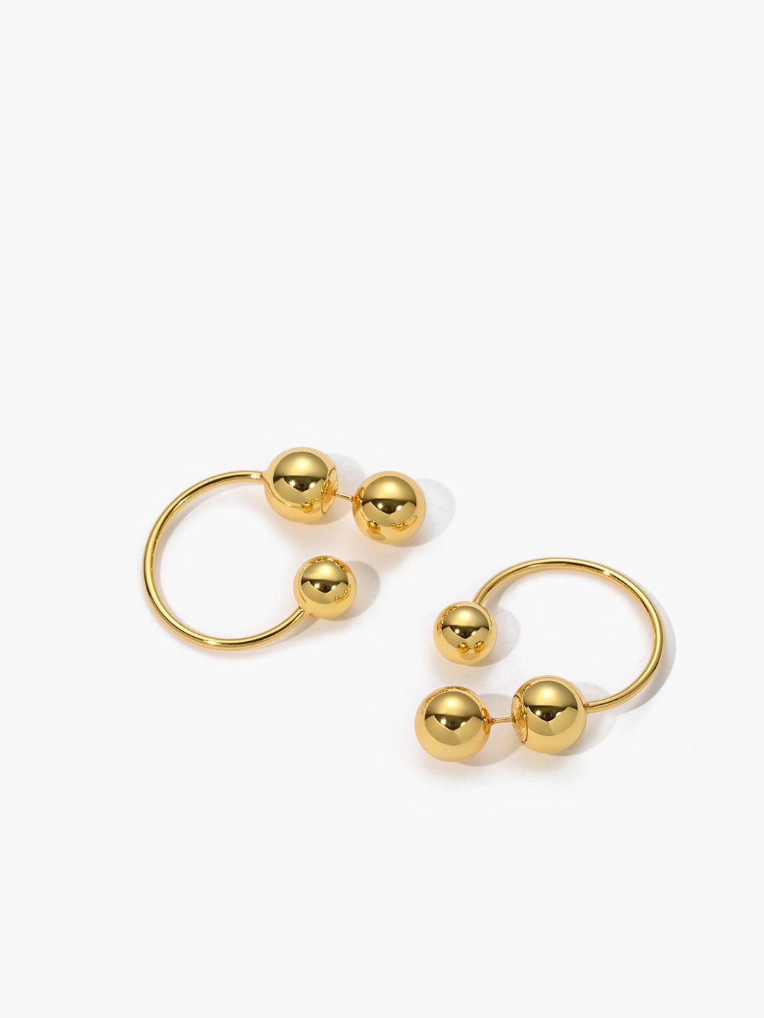 Goldene Kugelhoch-Ohrringe