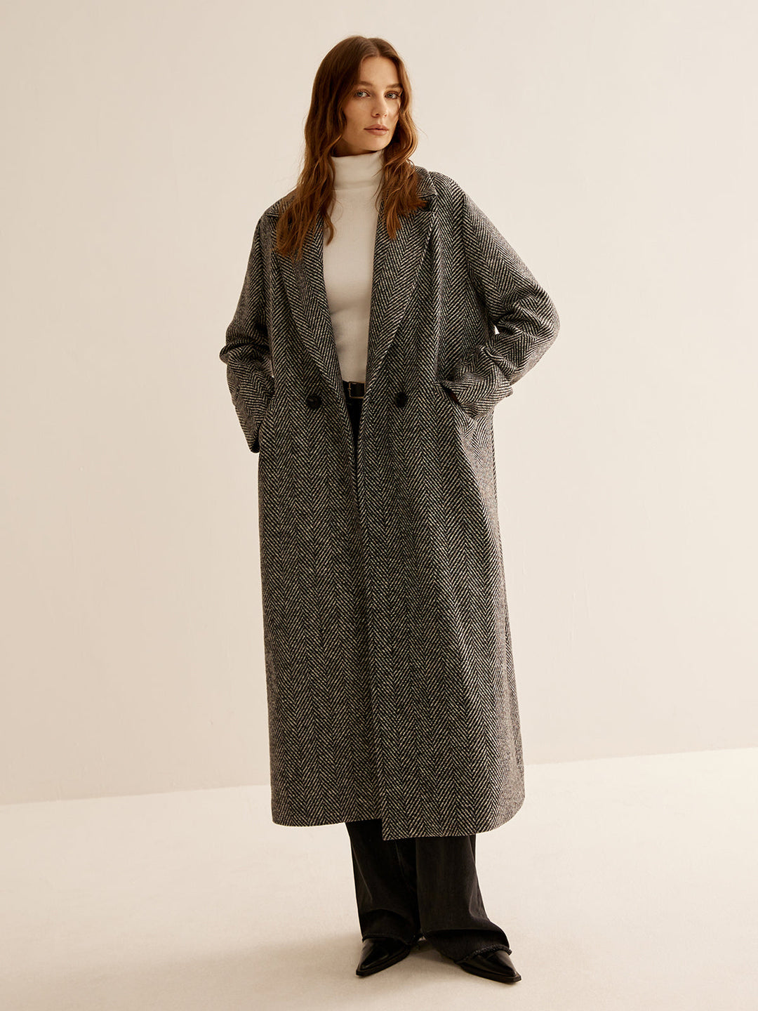 Zeitloser vielseitiger langer Trenchcoat