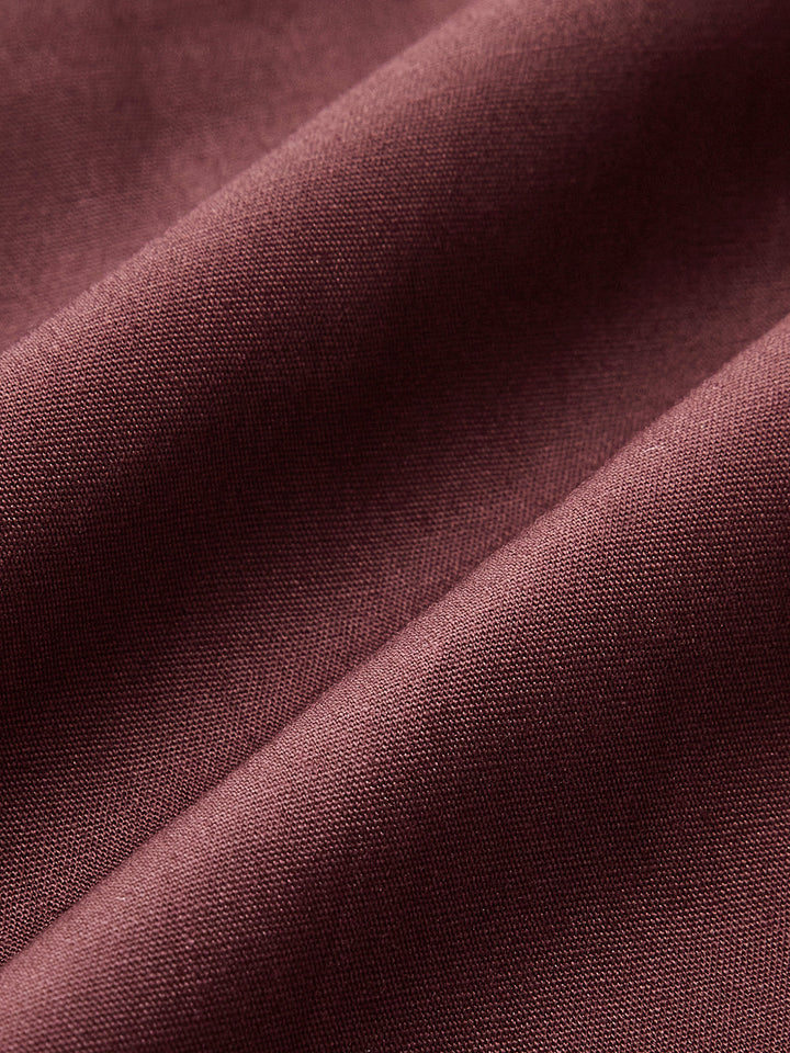 Figurformiges Kleid mit asymmetrischem Ausschnitt und langen Ärmeln