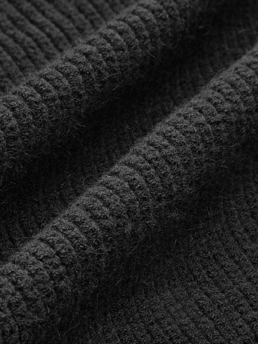 Rüschen-Strickweste