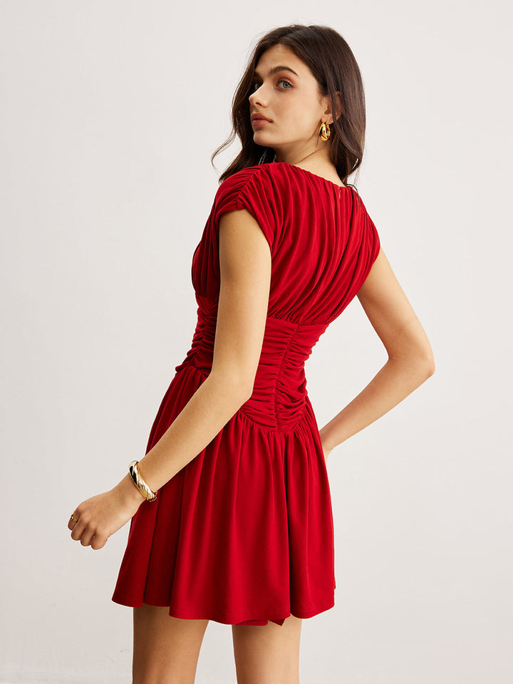 Elegantes Kleid mit Falten und Rüschen