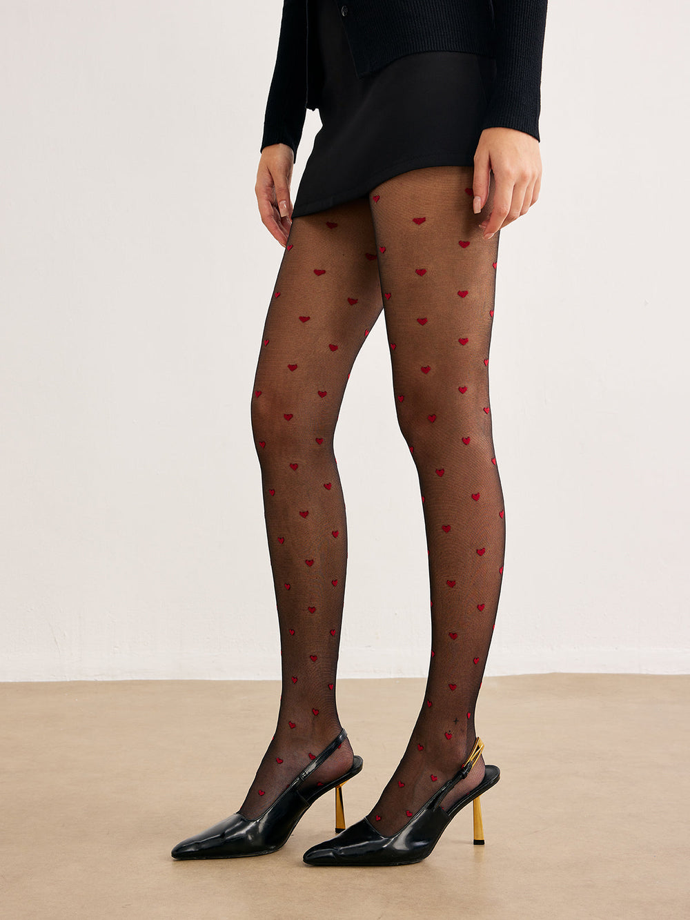 Tüllstrumpfhose mit Herzmuster