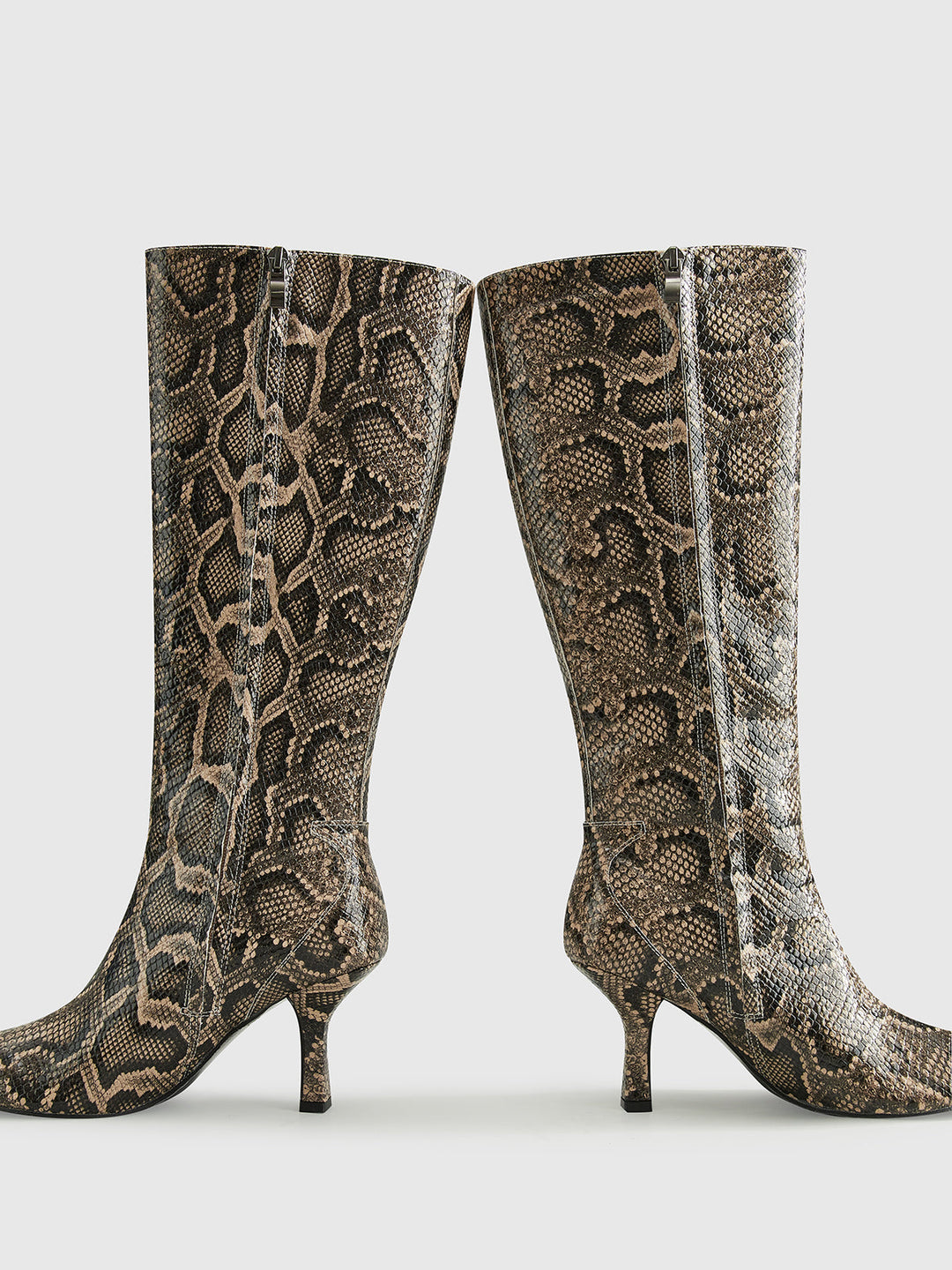 Stiefel mit Schlangenprint bis zum Knie