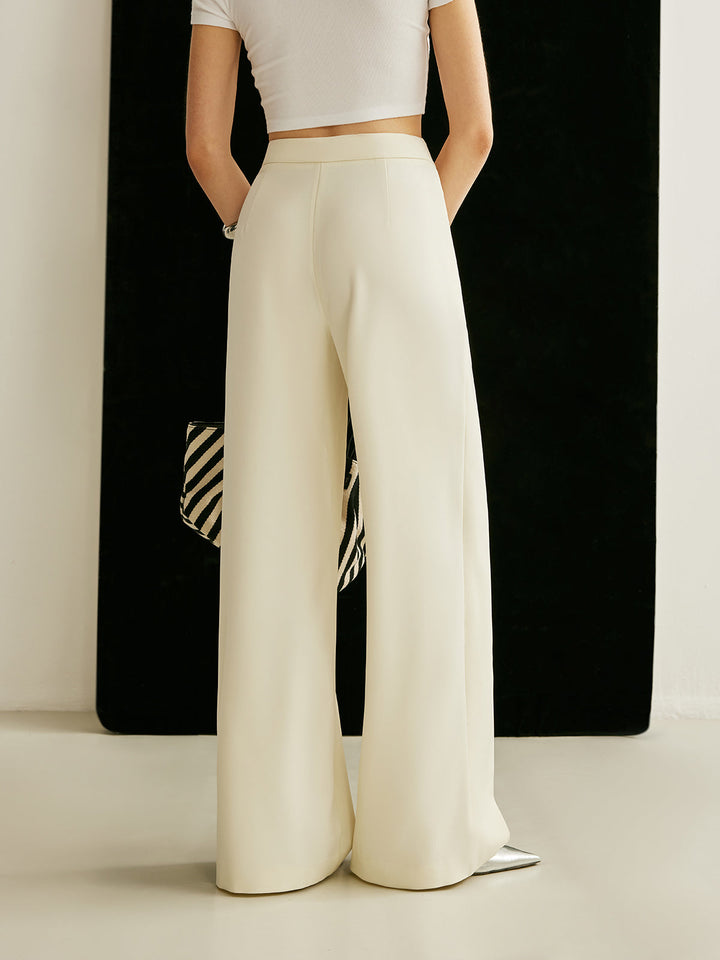 Asymmetrische Hose mit hoher Taille und Kreuzwickel