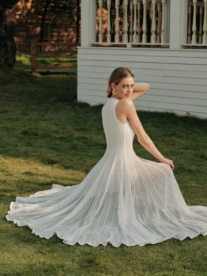 Ärmelloses Kleid aus halbtransparentem Spitzengewebe