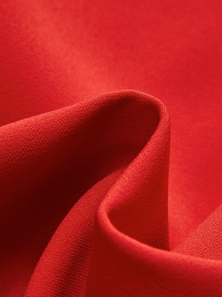 Rückenfreies, ärmelloses Kleid mit ausgestelltem Rock