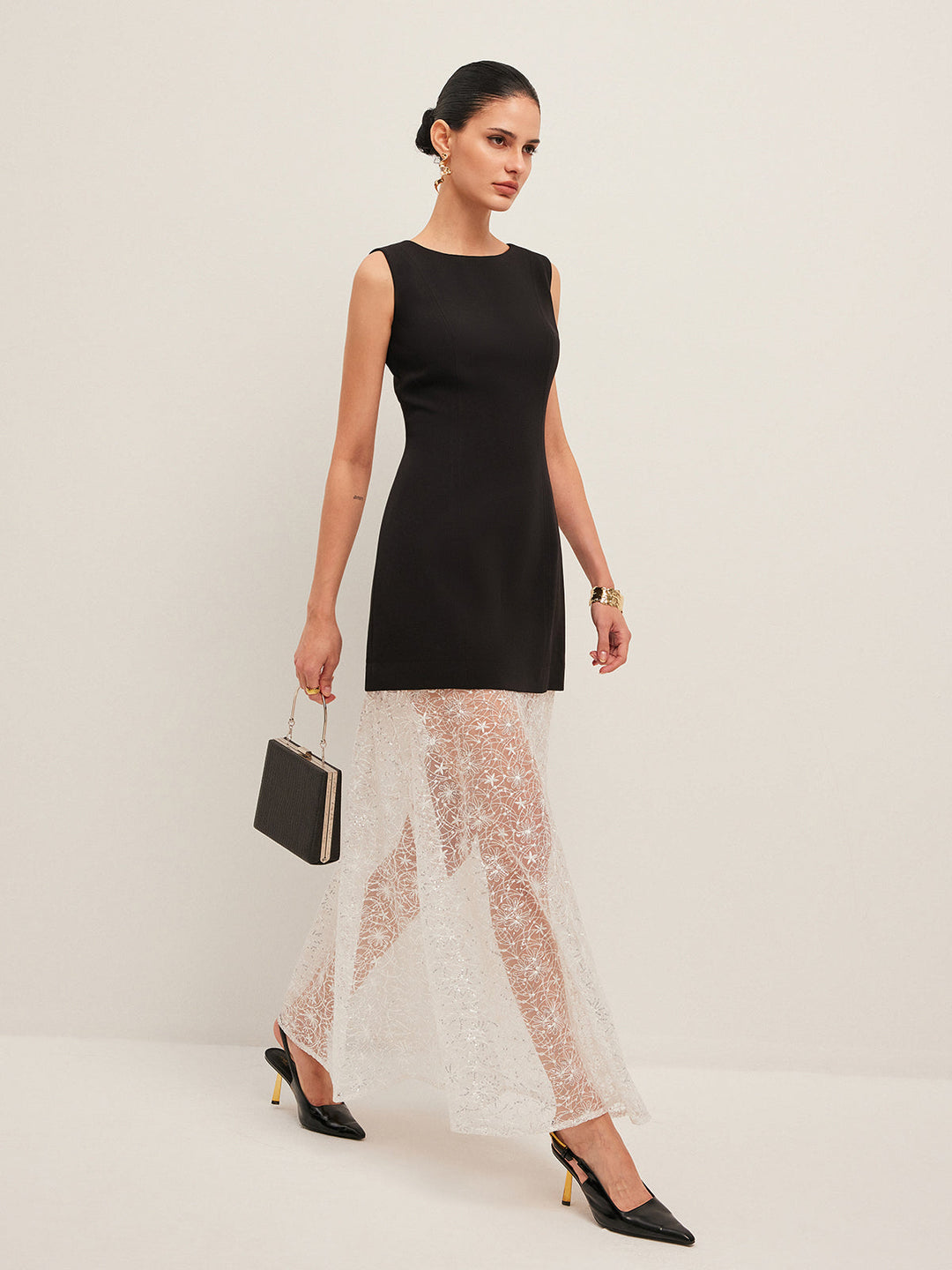 Kleid mit durchbrochenen Spitzeneinsätzen und ärmellosem Design