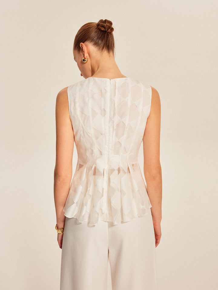 Halbtransparente geometrische Schößchenbluse