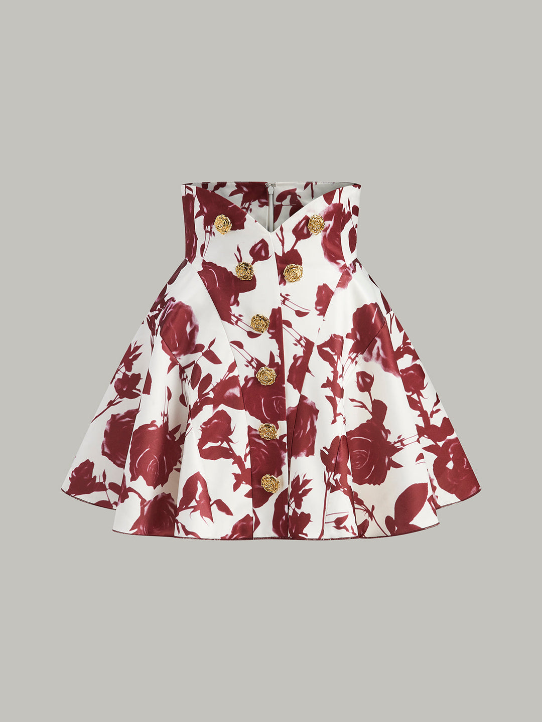 Rock mit Blumenmuster und Knopfdetail