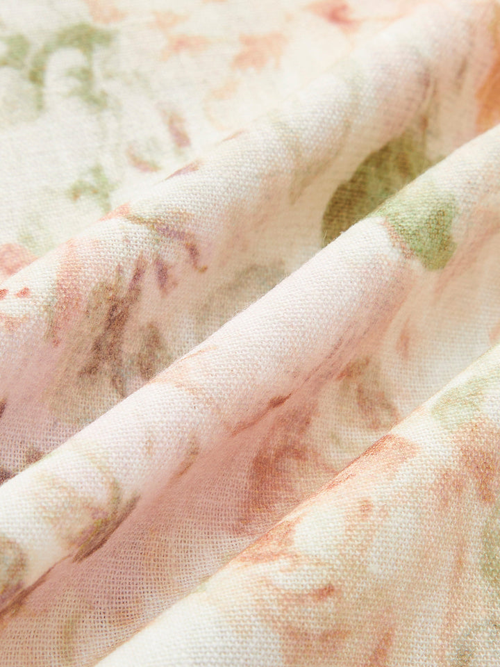 Kleid mit Puffärmeln aus Baumwolle und Leinen mit Blumenmuster und Gürtel