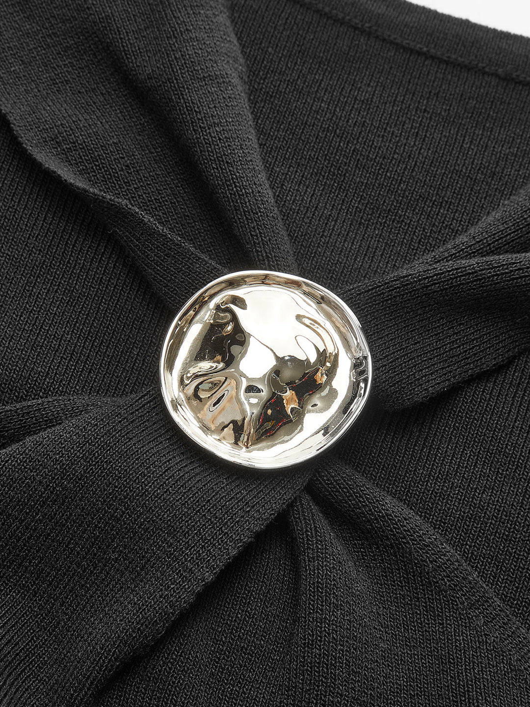 Dekorativer Knopf-Detail-Oberteil