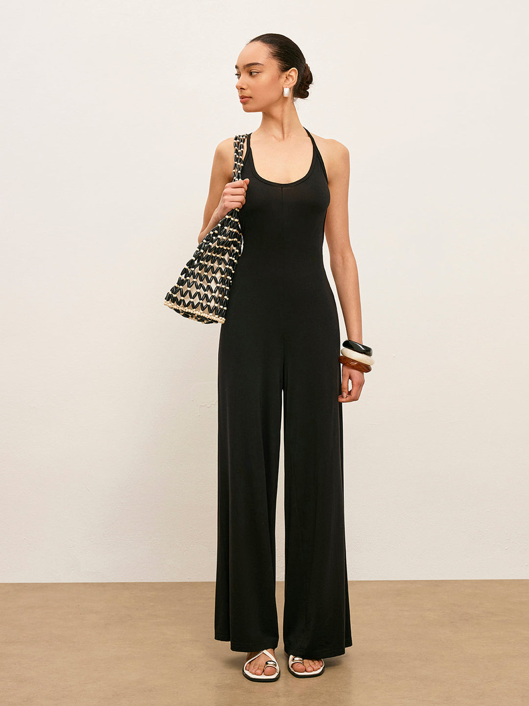 Strick-Jumpsuit ärmellos mit tiefem Rundhalsausschnitt und rückenfreiem Design