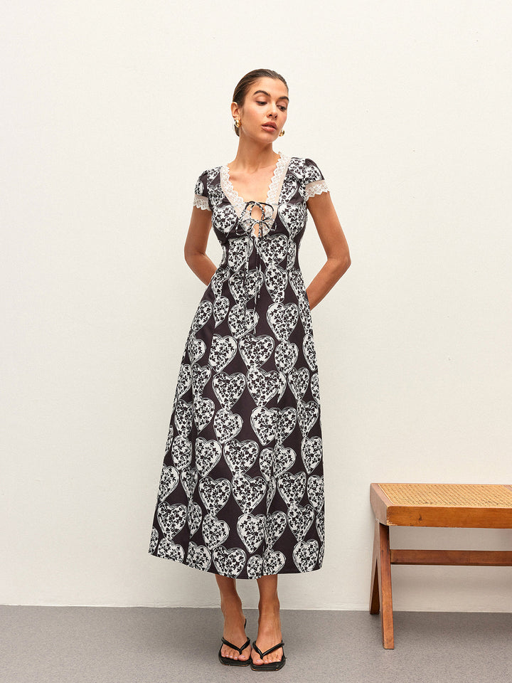 Blumenkleid mit V-Ausschnitt und Schleifenbindern