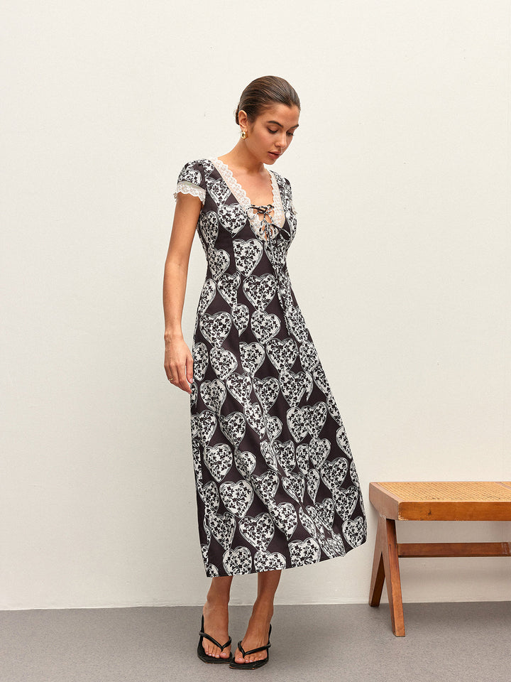 Blumenkleid mit V-Ausschnitt und Schleifenbindern