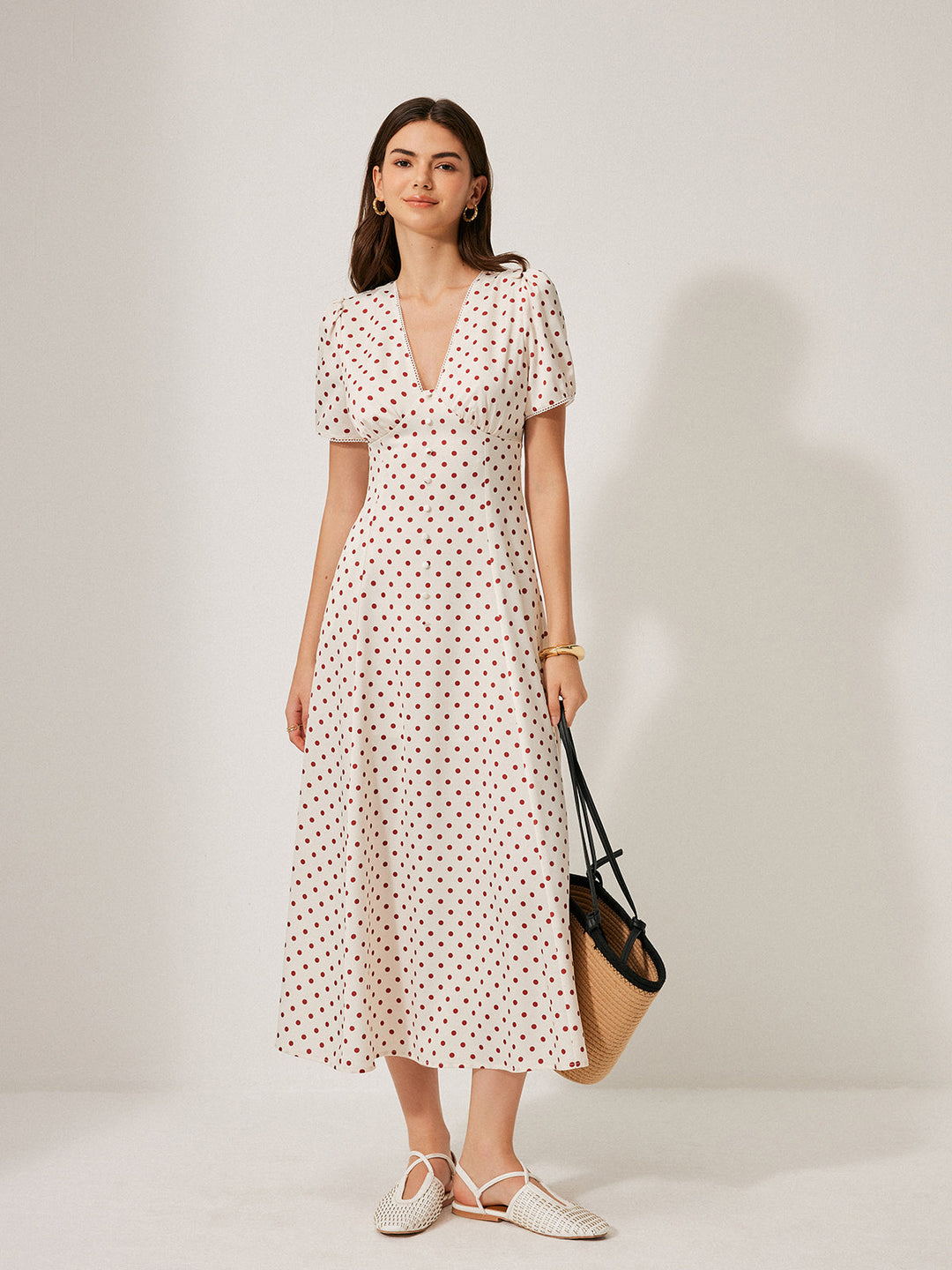 Kleid mit Puffärmeln und Polka-Dot-Muster