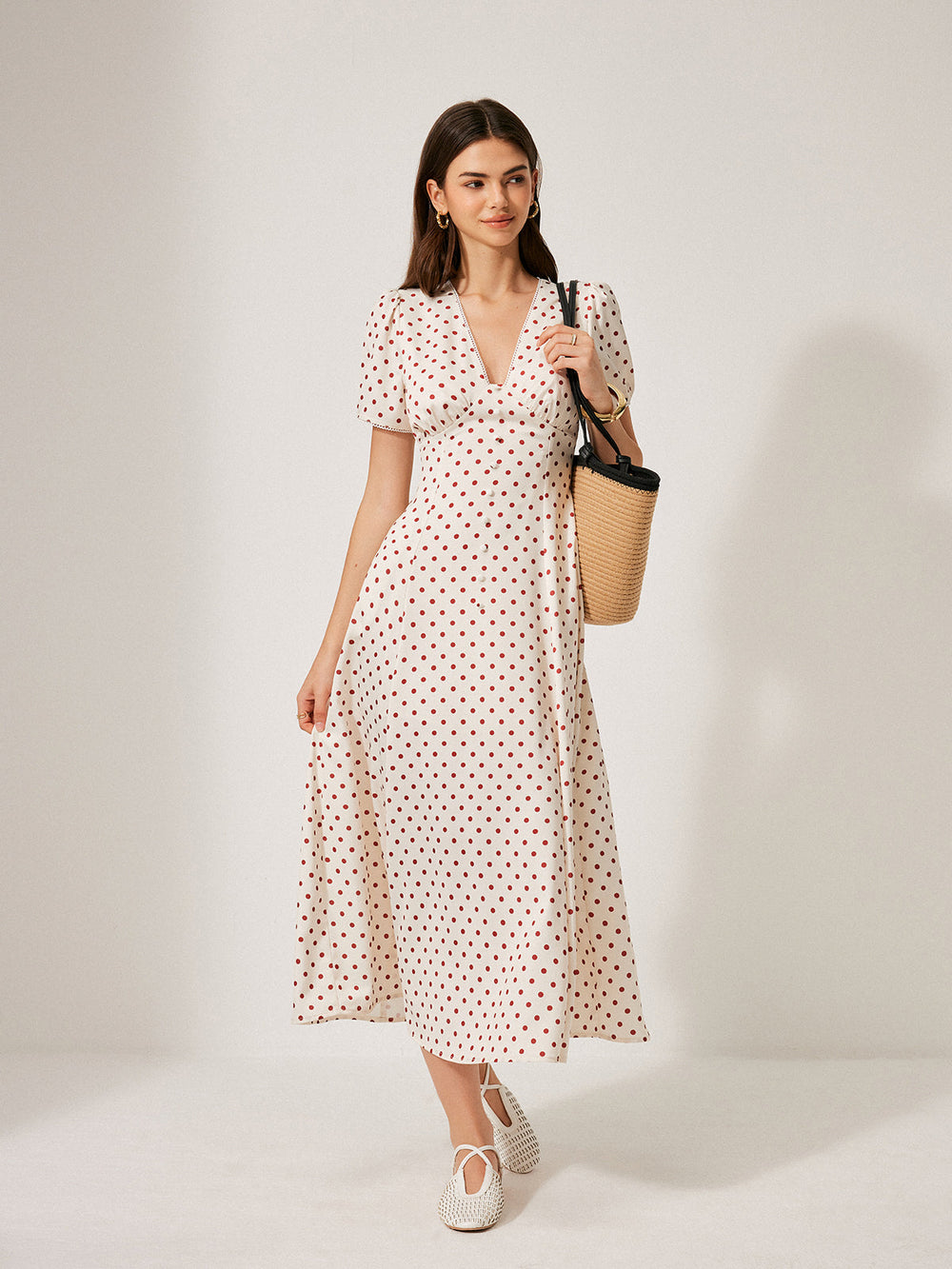 Kleid mit Puffärmeln und Polka-Dot-Muster