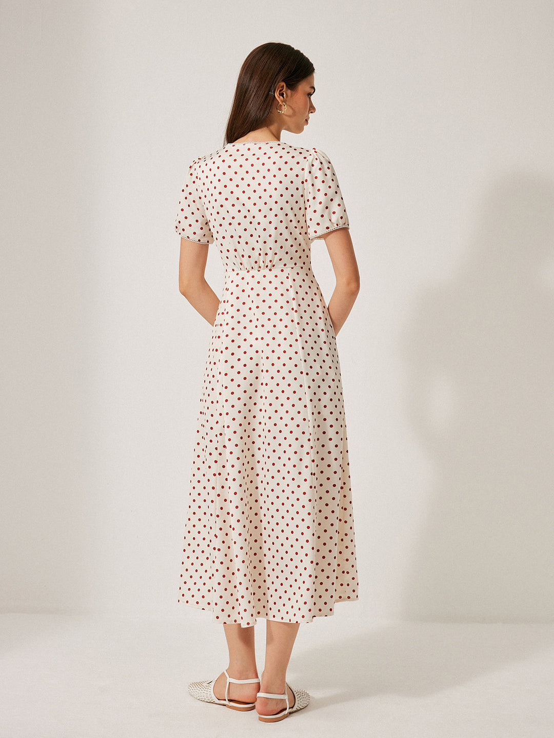 Kleid mit Puffärmeln und Polka-Dot-Muster