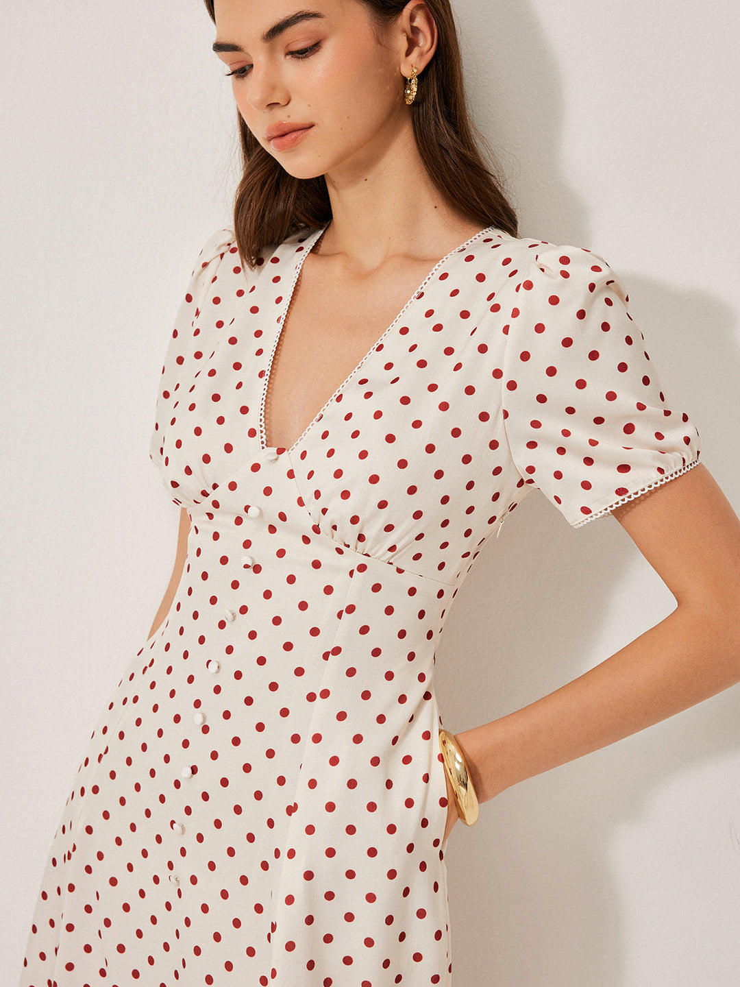 Kleid mit Puffärmeln und Polka-Dot-Muster