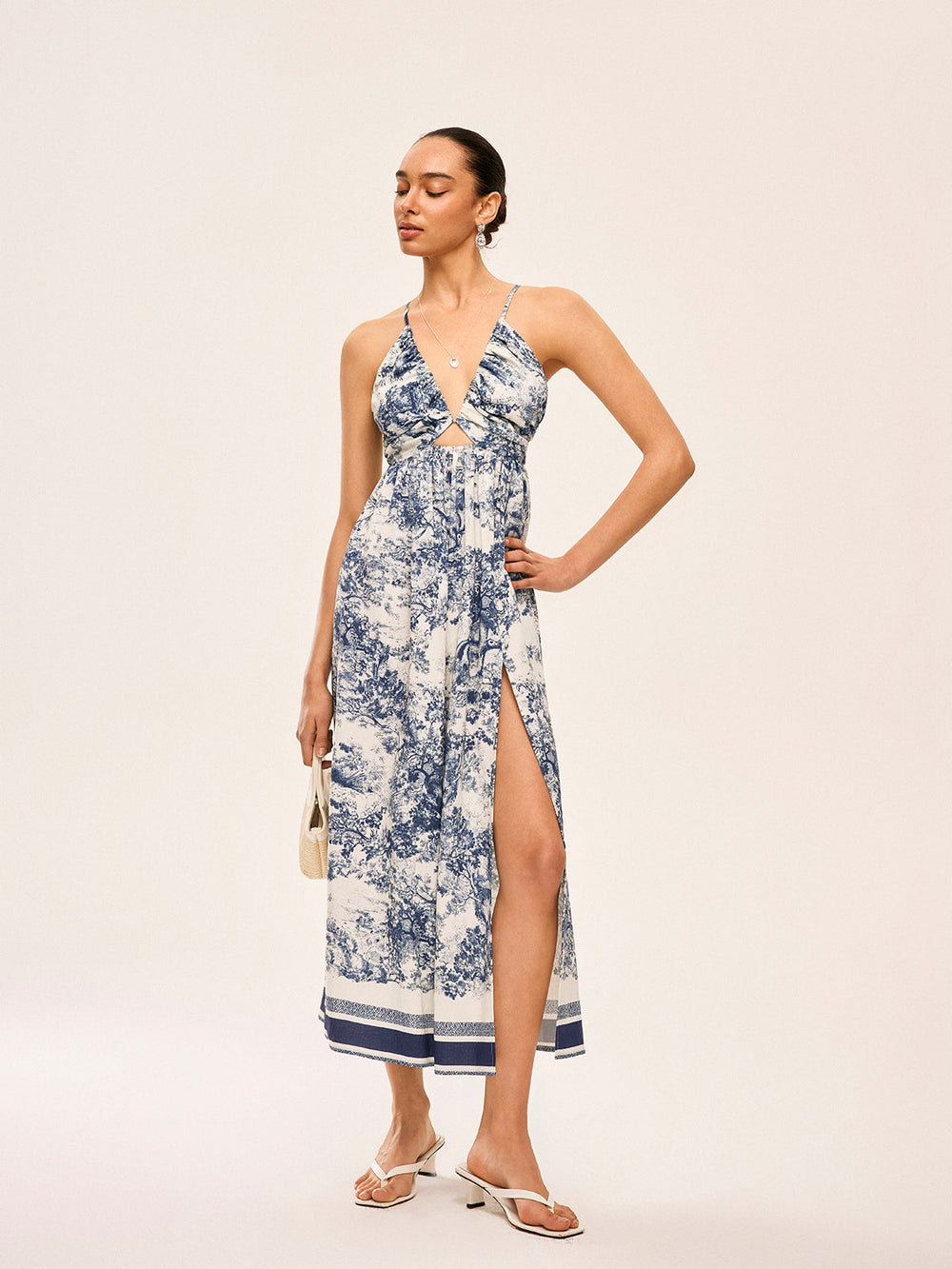 Bedrucktes Kleid mit Kontrastbesatz und Knoten
