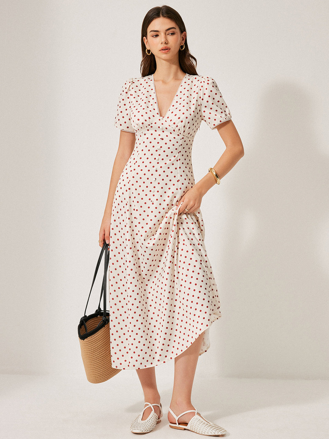 Kleid mit Puffärmeln und Polka-Dot-Muster