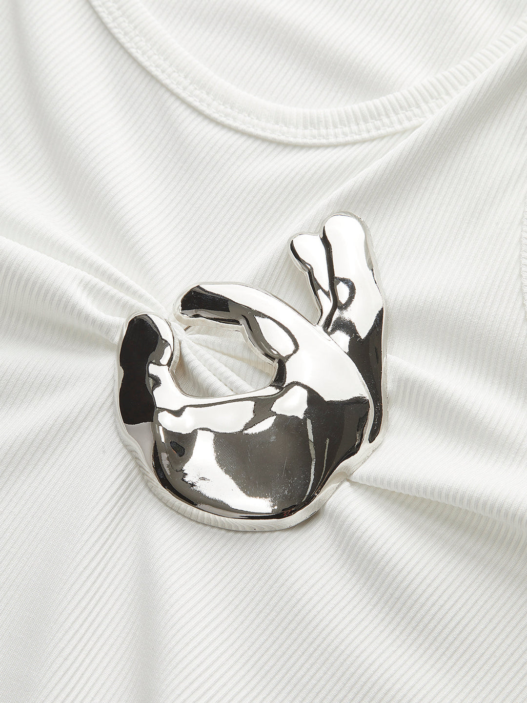Rippstrick-Oberteil mit Metalldetail