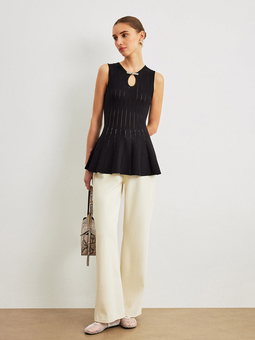 Semi-Sheer Strick-Peplum-Oberteil mit Schleifendetail