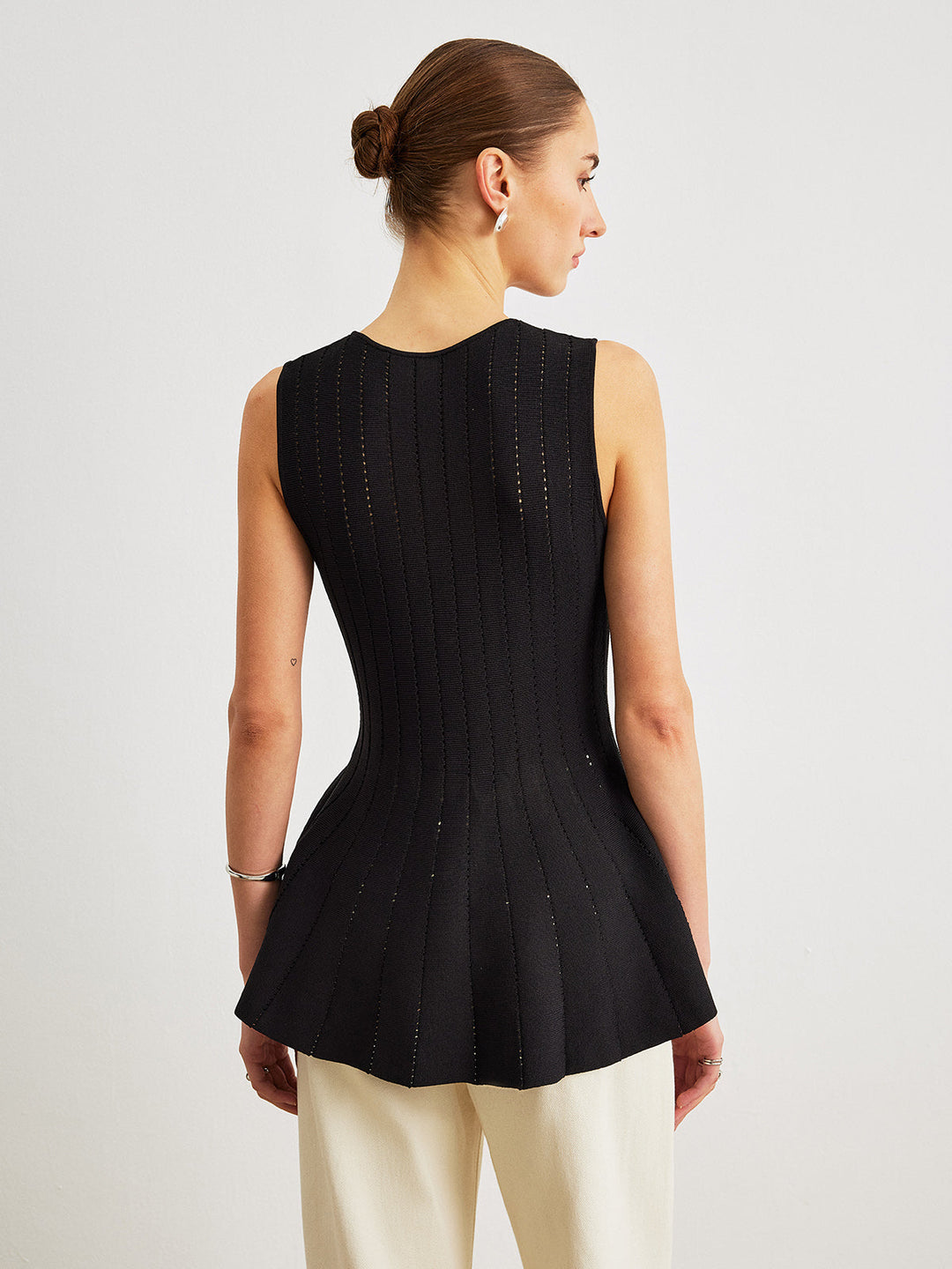 Semi-Sheer Strick-Peplum-Oberteil mit Schleifendetail