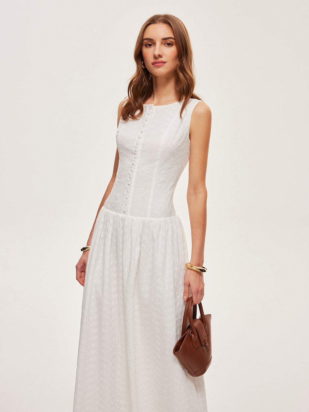 Kleid mit durchgehender Knopfleiste aus Baumwolle und ärmellosem Design