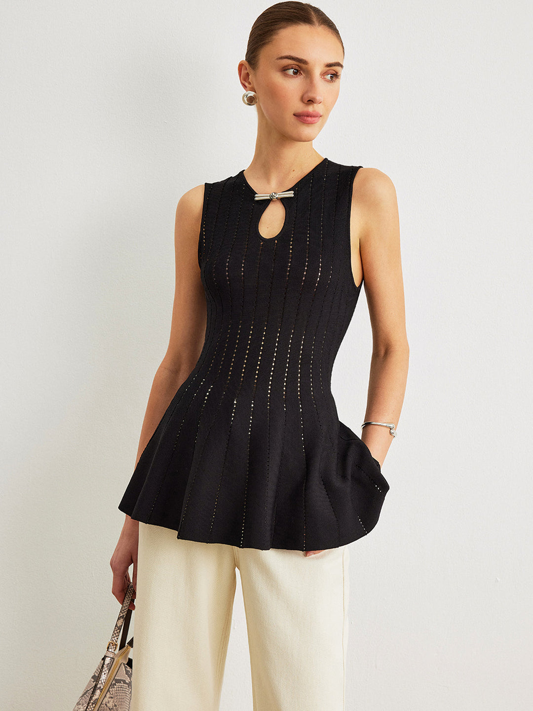 Semi-Sheer Strick-Peplum-Oberteil mit Schleifendetail