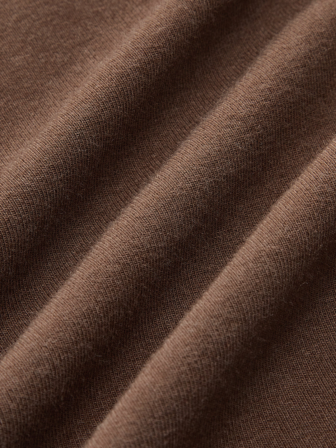 Asymmetrisches Wickeltop mit Knopfdetail
