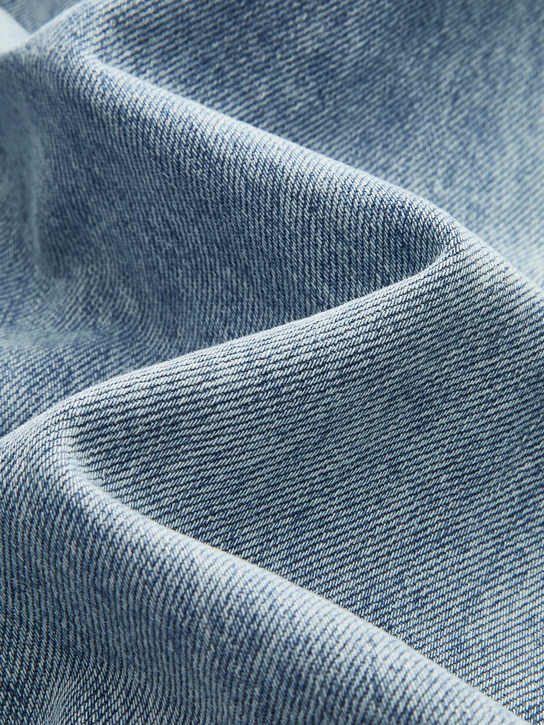 Asymmetrische Jeans mit weitem Bein und Taille