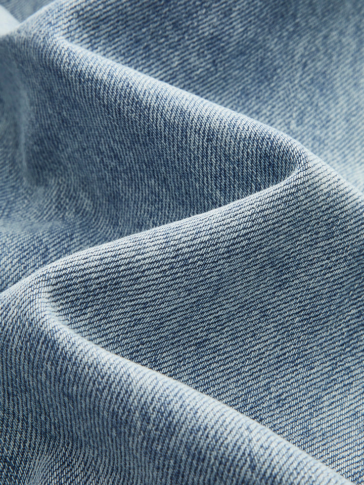 Asymmetrische Jeans mit weitem Bein und Taille