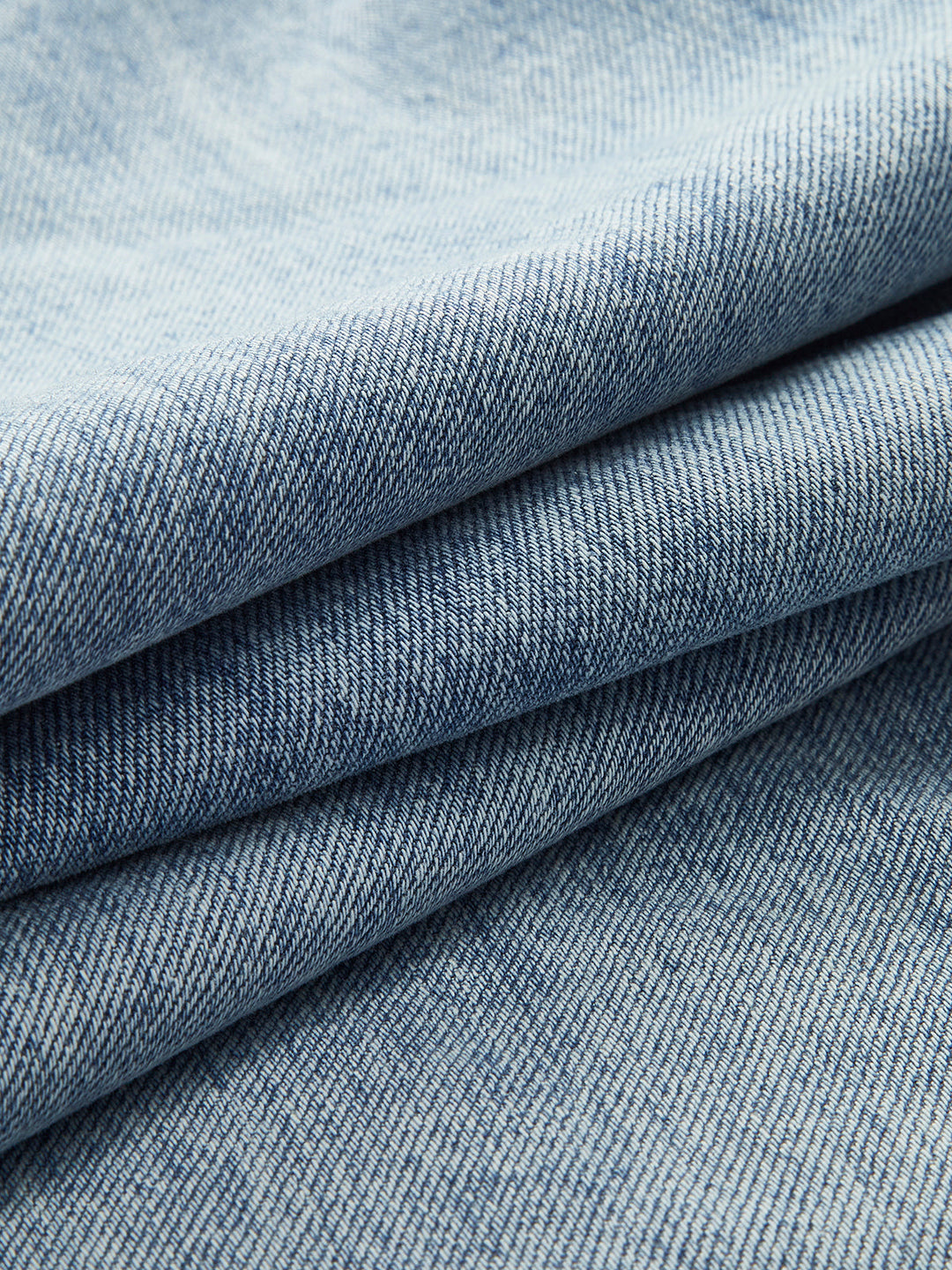 Asymmetrische Jeans mit weitem Bein und Taille