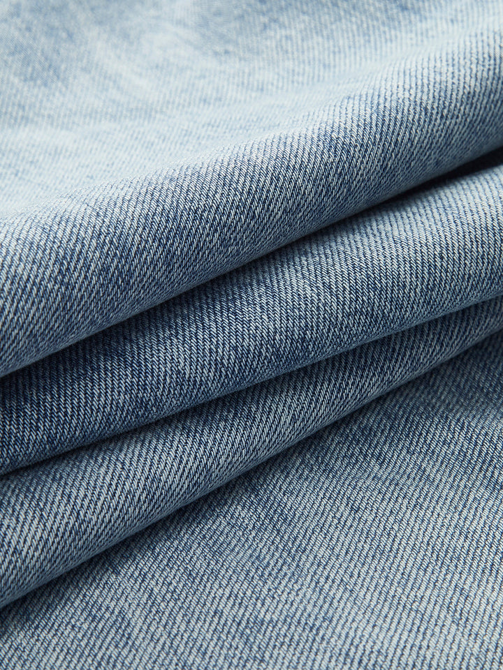 Asymmetrische Jeans mit weitem Bein und Taille