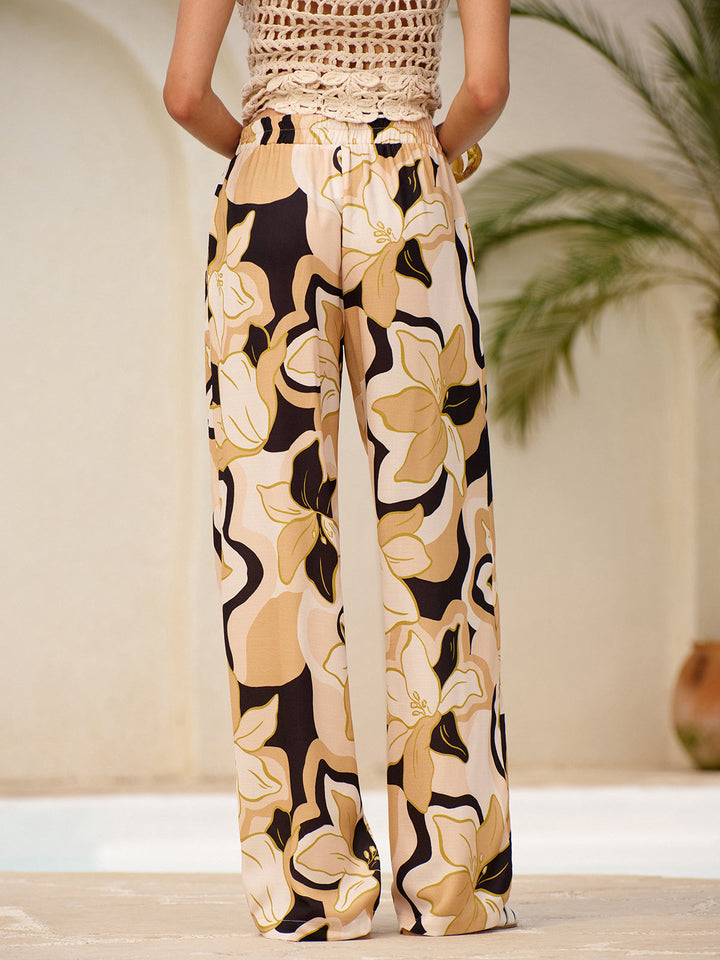 Mittel taillierte Hose mit Blumendruck und Taschen