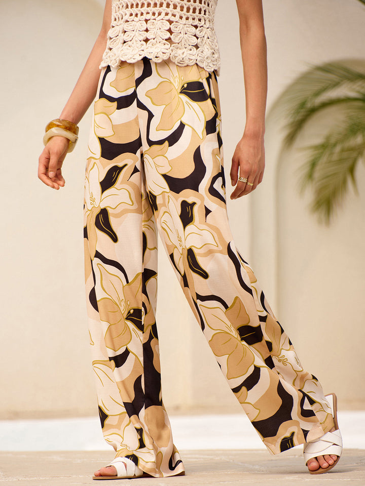 Mittel taillierte Hose mit Blumendruck und Taschen