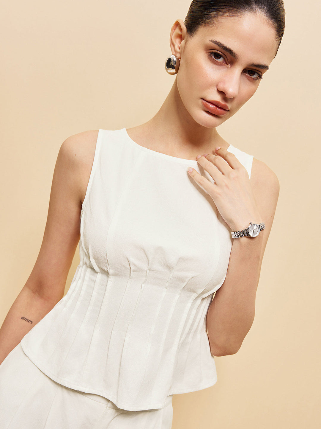 Peplum-Oberteil mit weit geschnittenen Hosen