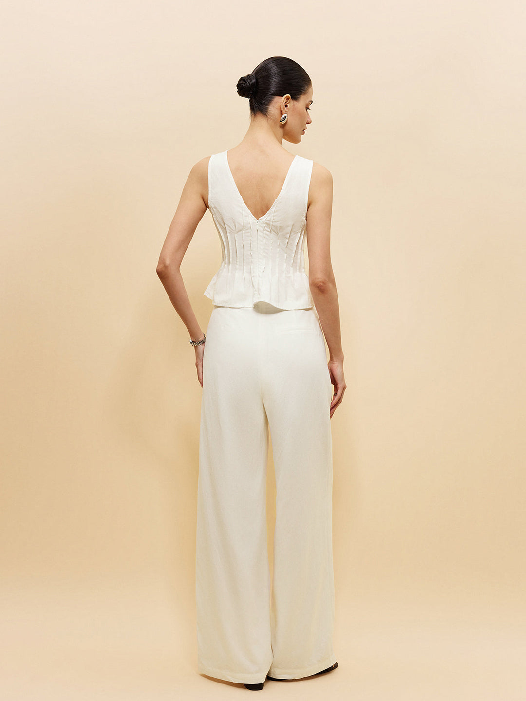 Peplum-Oberteil mit weit geschnittenen Hosen
