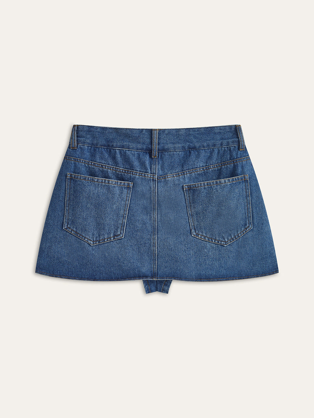 Taschenrock aus asymmetrischem Denim