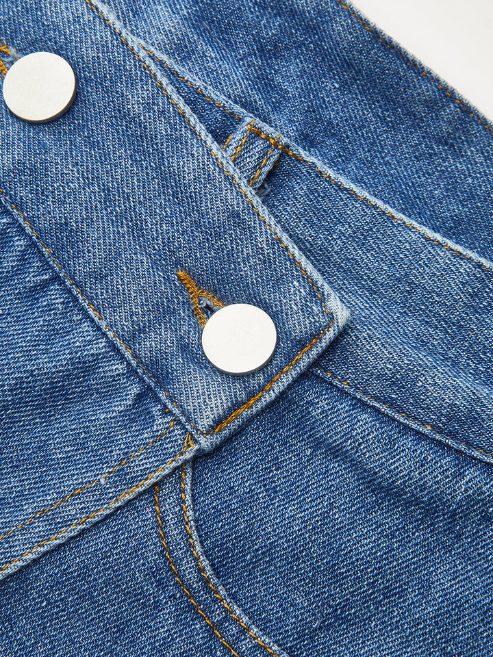 Taschenrock aus asymmetrischem Denim