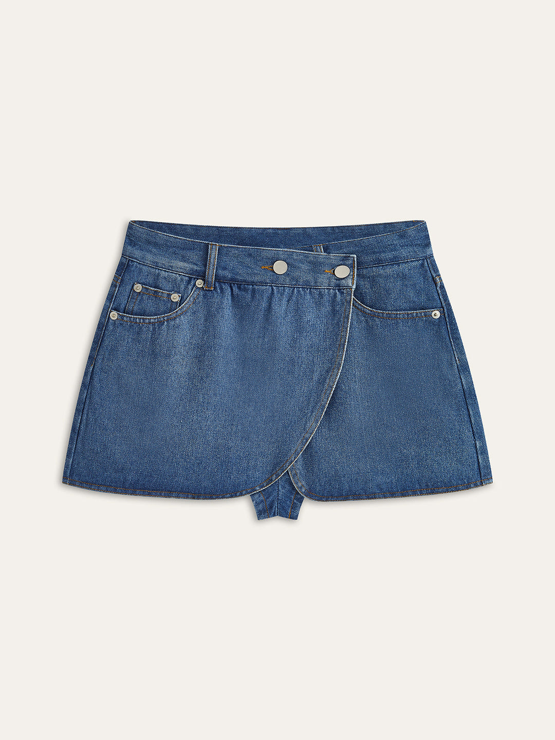 Taschenrock aus asymmetrischem Denim